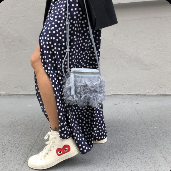 Comme des Garcons PLAY Shoes - CdG PLAY x Converse Unisex Chuck Taylor All Star Peek-A-Boo High-Top Sneakers
